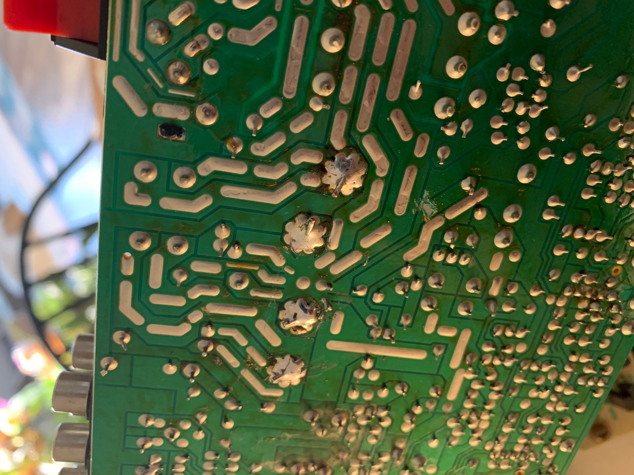 The circuit board with new connections soldered