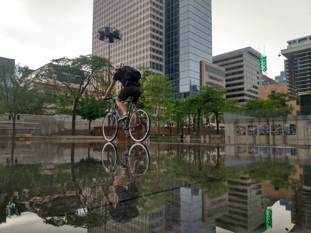 Photo of the author reflected Peavy Plaza -- PC: Adrian