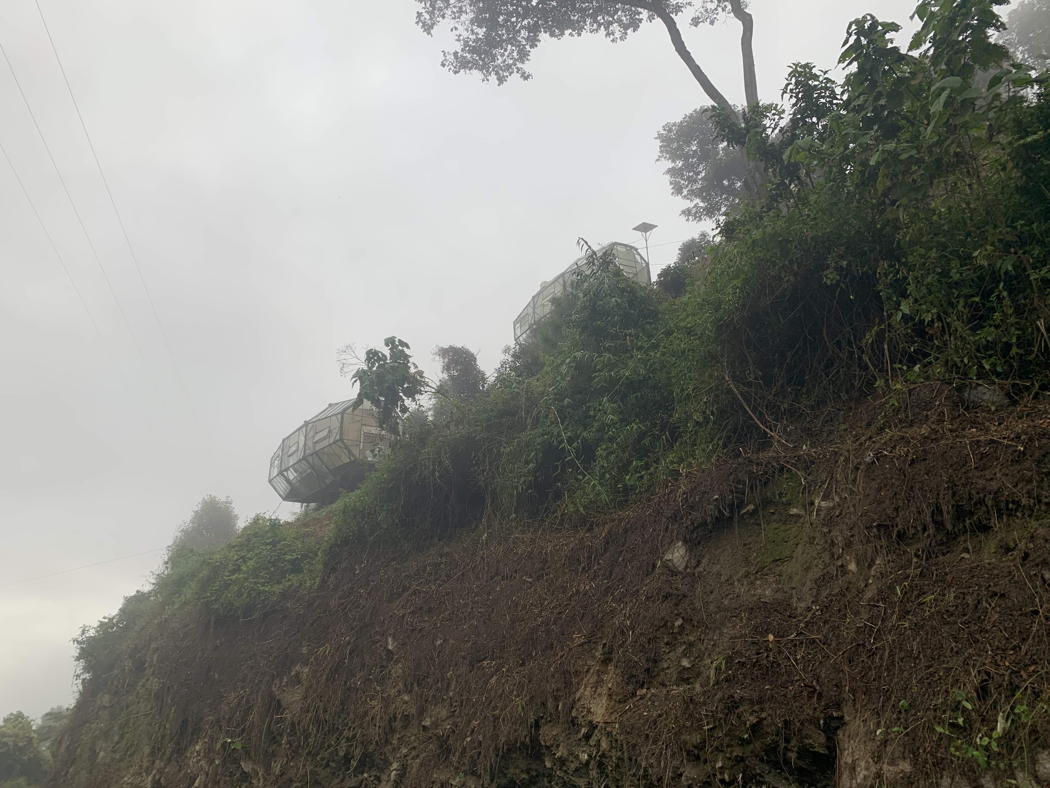 Tourist sleeping quarters in a cloud forest, now defunct and at risk of tumbling